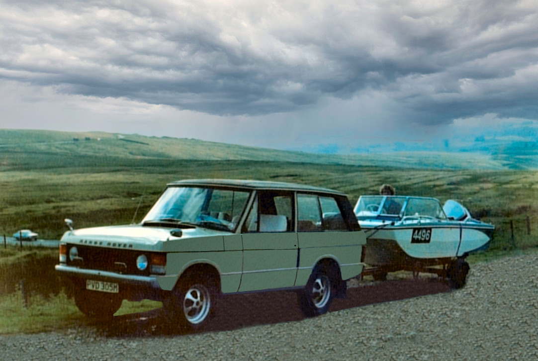 Mick Robson at the wheel of the family speedboat, towed behind a Range Rover on the moors in the 1970s