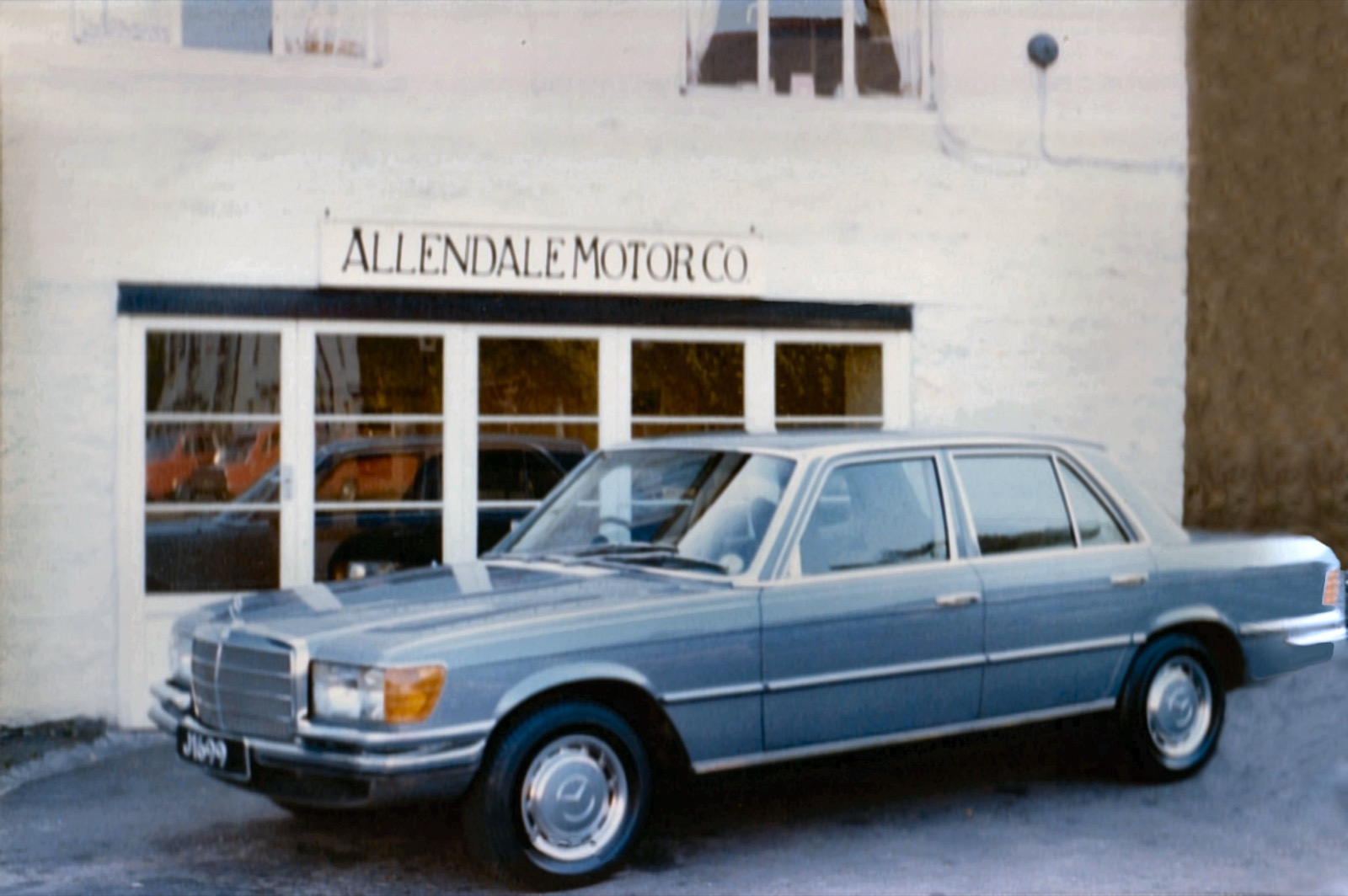 A Mercedes SL under the Allendale Motor Co sign